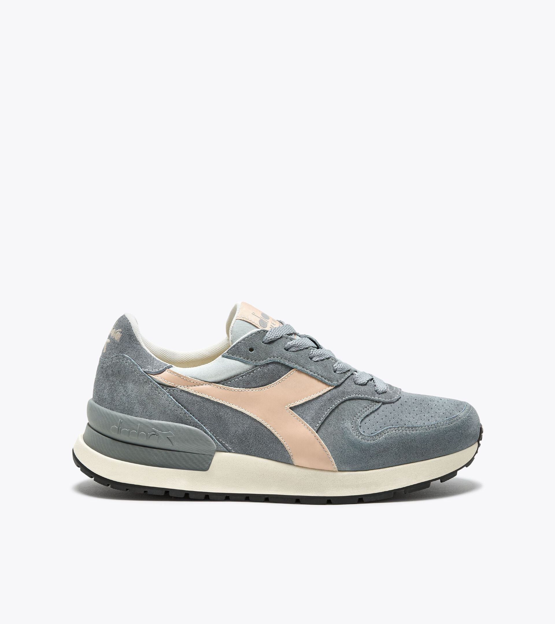 Ace Rivington Diadora Conquest Suede SW - High Rise sneaker featuring a grey suede upper with a beige Diadora logo, white midsole, and black outsole. The shoe has a classic running silhouette with detailed stitching and a padded collar for comfort.