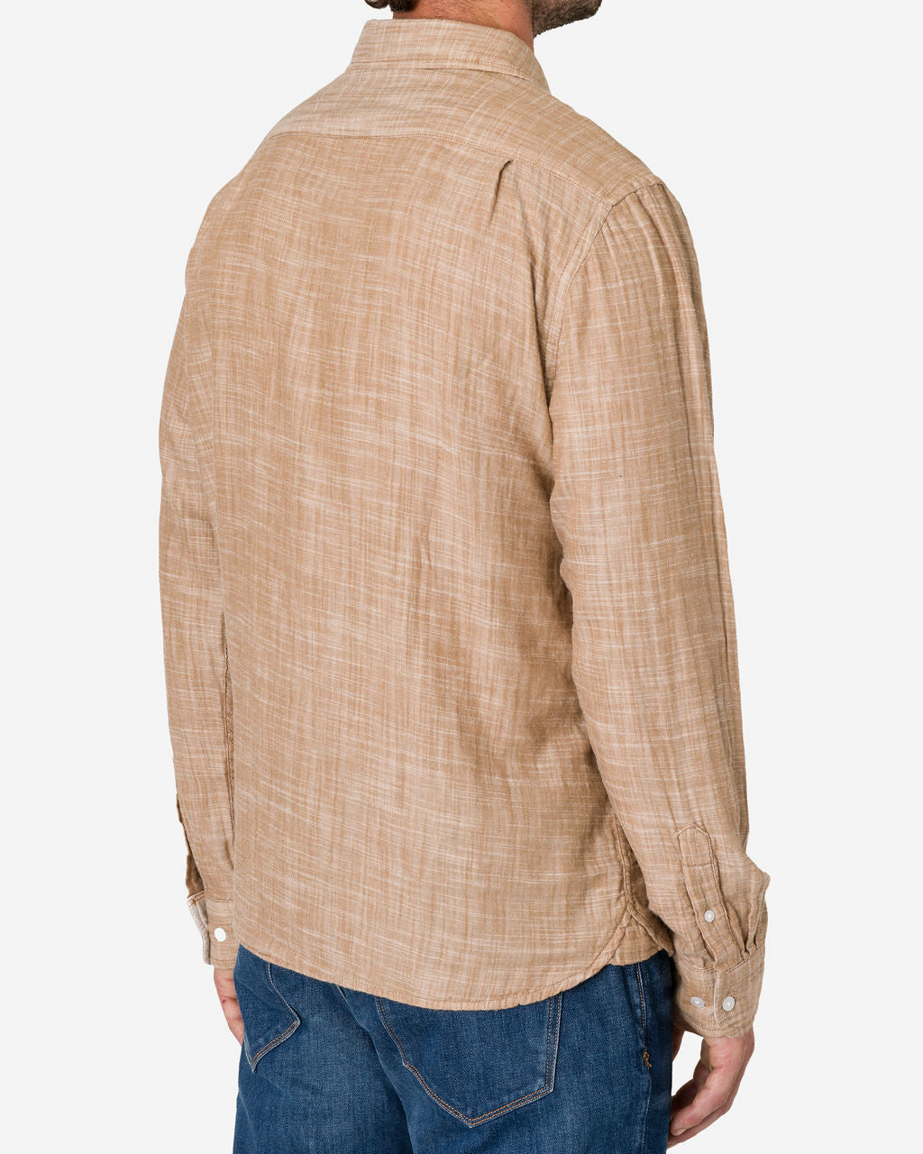 Ace Rivington Double Gauze Long Sleeve Camel shirt, viewed from the back, worn by a man in blue jeans. The shirt features a subtle checkered pattern and has buttoned cuffs.