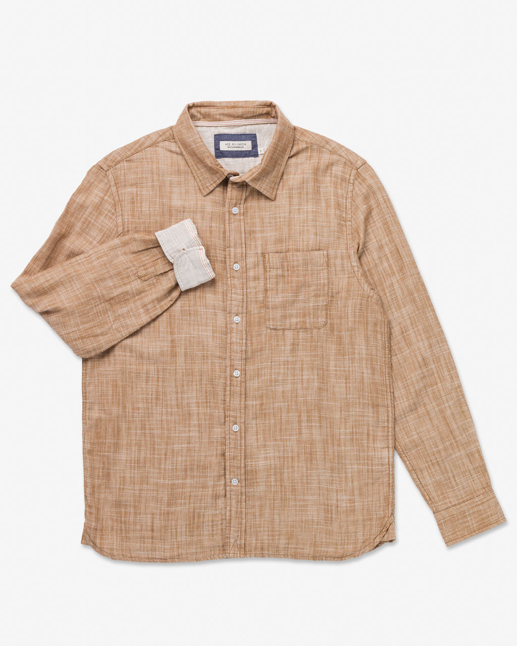 Ace Rivington Double Gauze camel-colored long-sleeve shirt, featuring a subtle checkered pattern. It includes a single chest pocket on the left side and has a collar, with white buttons running down the front. One sleeve is partially rolled up, showcasing a lighter inner lining against a plain white background.