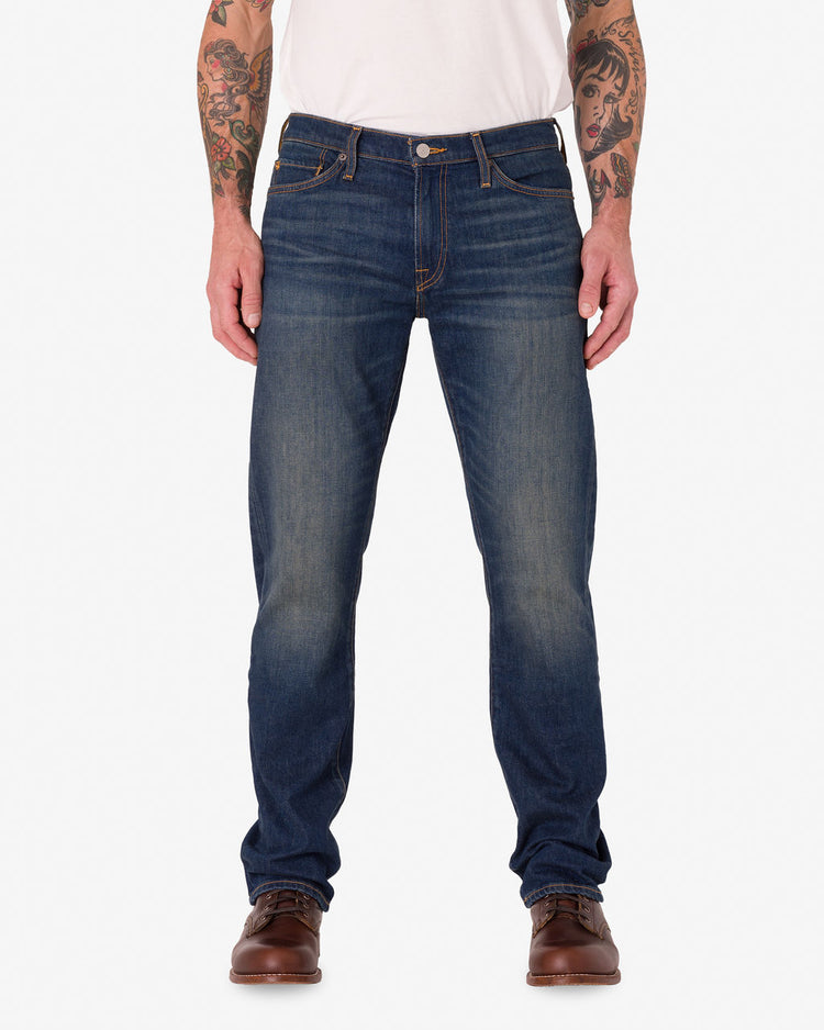 Men Wearing Ace Rivington - Athletic Straight Leg Denim Jeans with Dirty Vintage Color and Plain White Shirt.