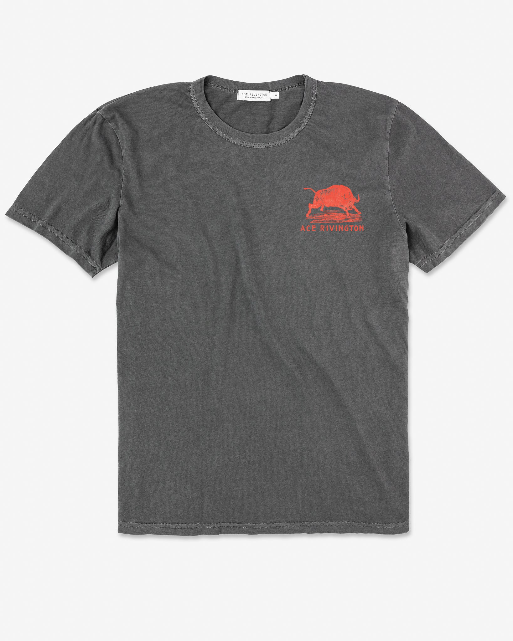 A dark-gray Ace Rivington Supima Tee - Crewneck SS - Bullseye Carbon t-shirt features a small red-orange graphic of a bull with the written text 'ACE RIVINGTON' on the left chest area.