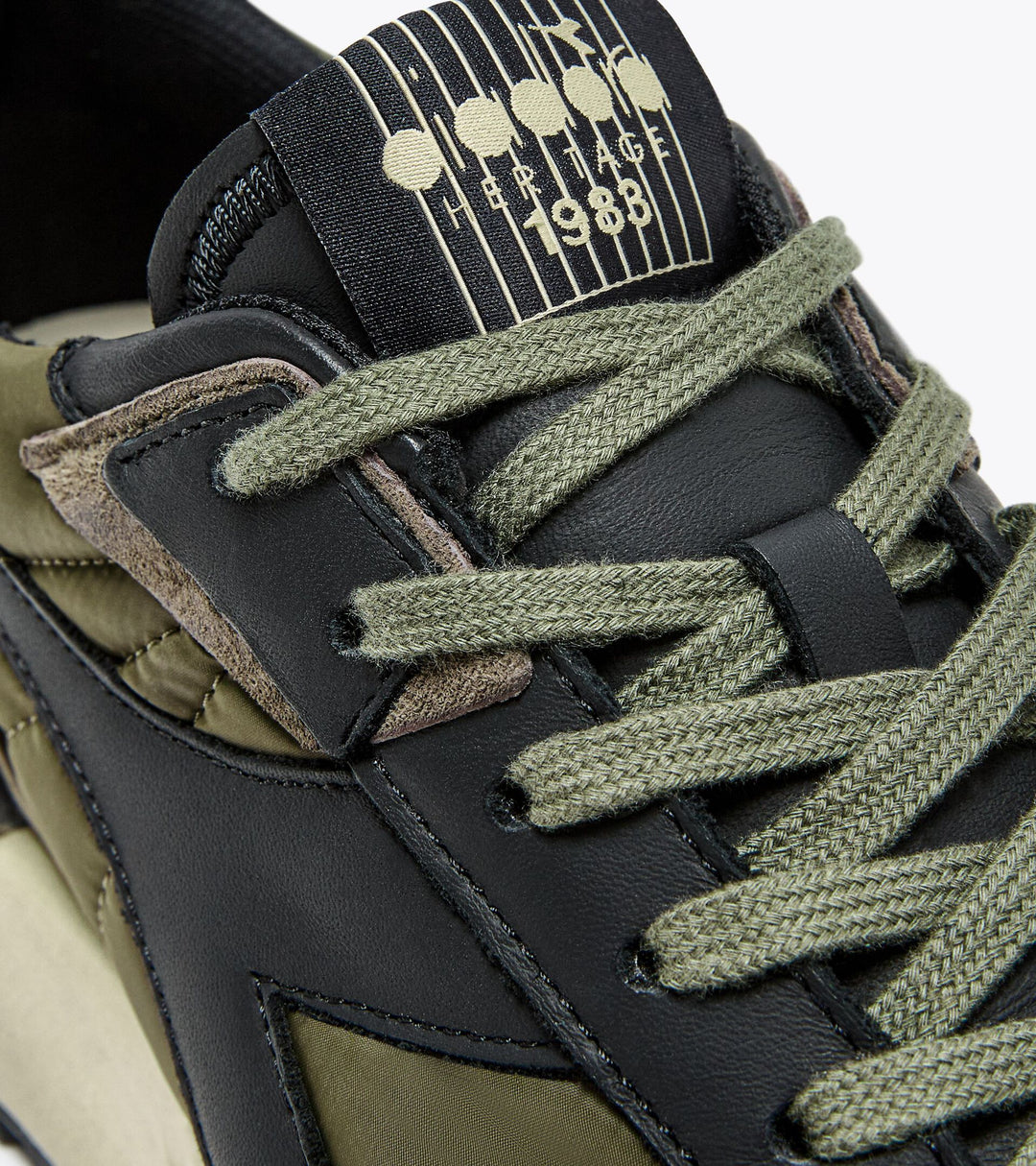 Ace Rivington Diadora - Mercury Elite - Beech Green close-up of the tongue featuring the brand logo and "1988" year badge.