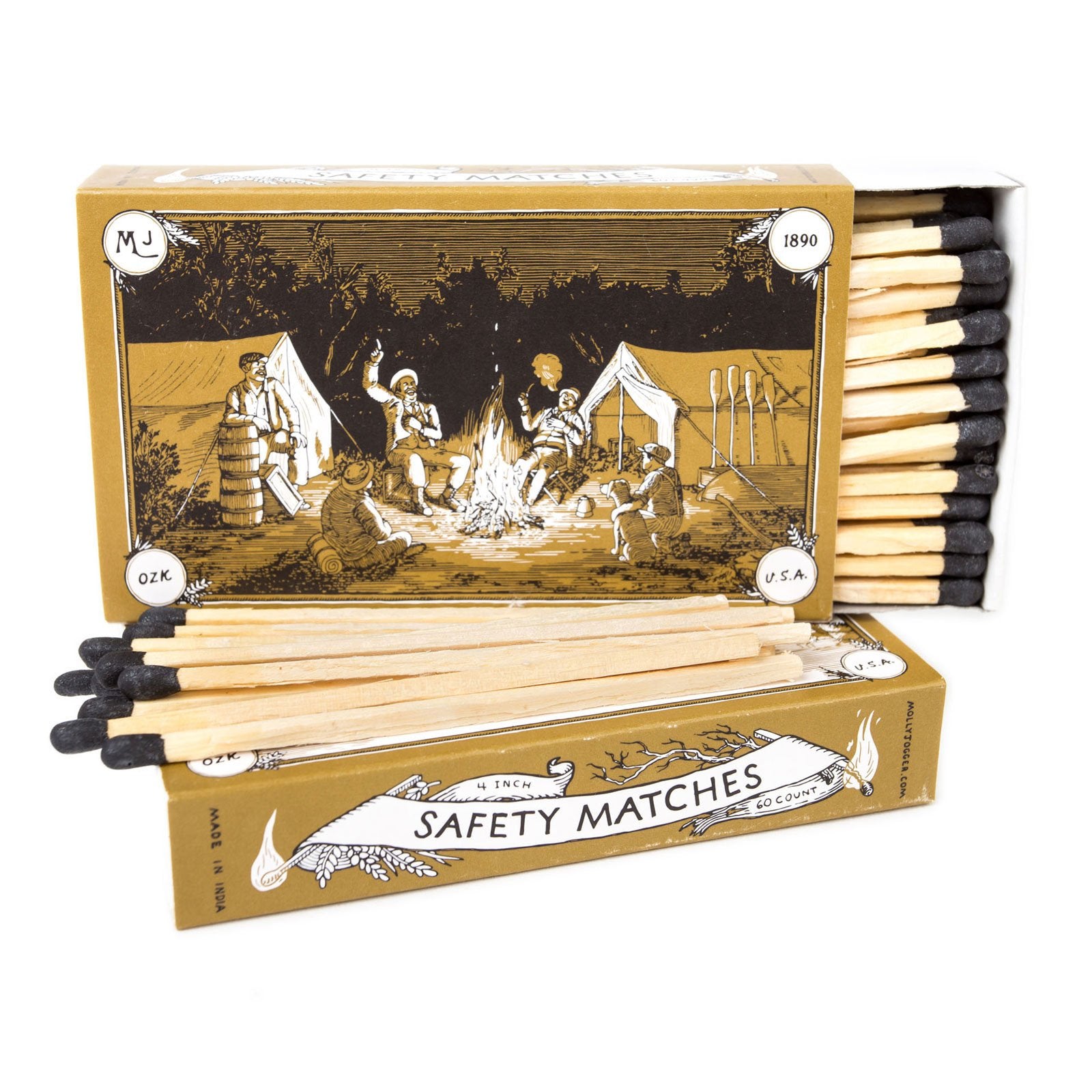 Ace Rivington Mollyjogger Camping Safety Matches. The matchbox features an illustration of a camping scene with people gathered around a campfire, surrounded by tents and trees and labeled with '1890' and 'U.S.A.' The matches have wooden sticks with black tips, and some are partially pulled out of the box.